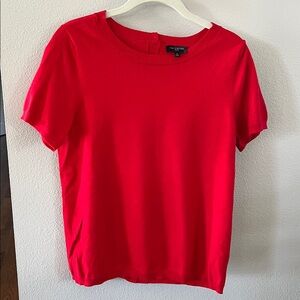 Red short sleeved sweater.